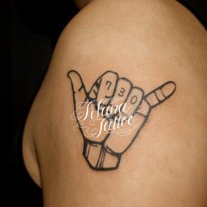 Hand Sign Tattoo